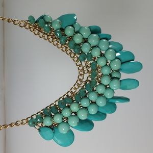 New. Aqua and mint necklace with yellow gold chain.